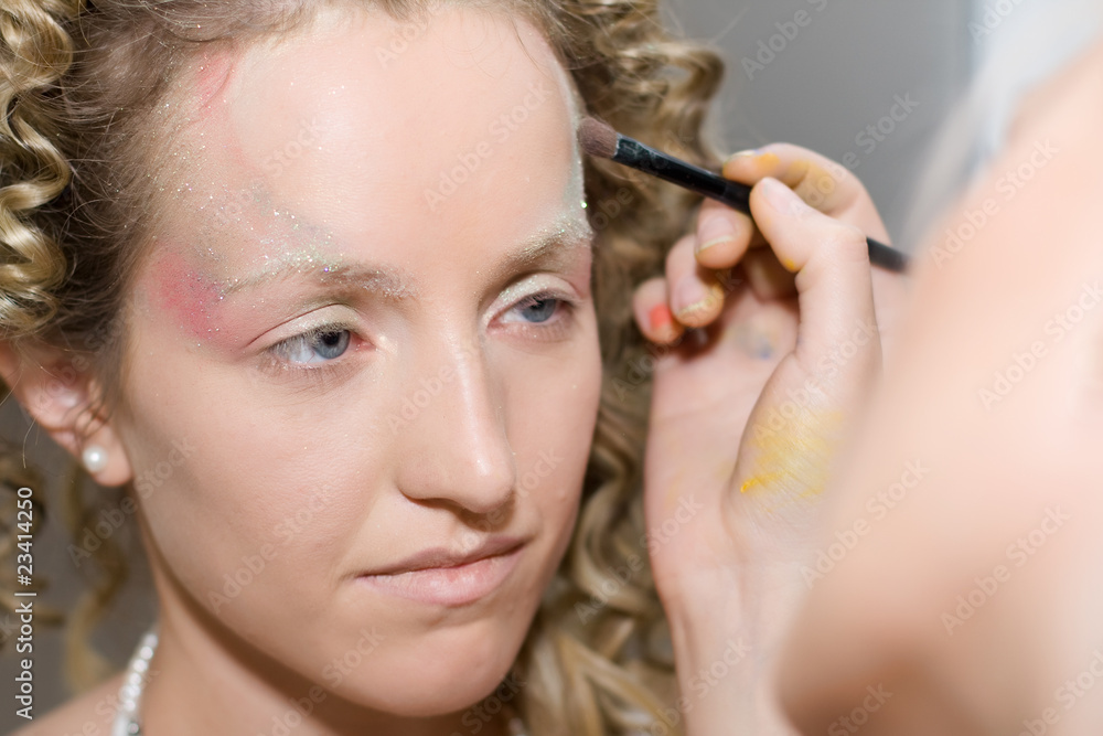 professional visagiste does a bright make-up professional visagiste does a bright make-up