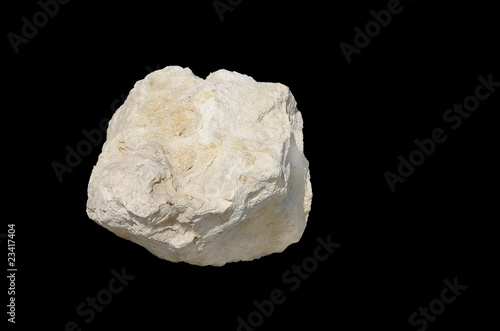 White Limestone isolated on black photo