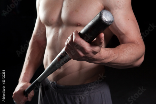 Canvas Print Shirtless guy holding a baseball bat