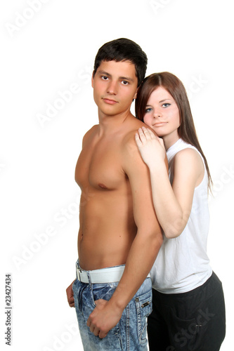 Sexy young couple hug isolated on white