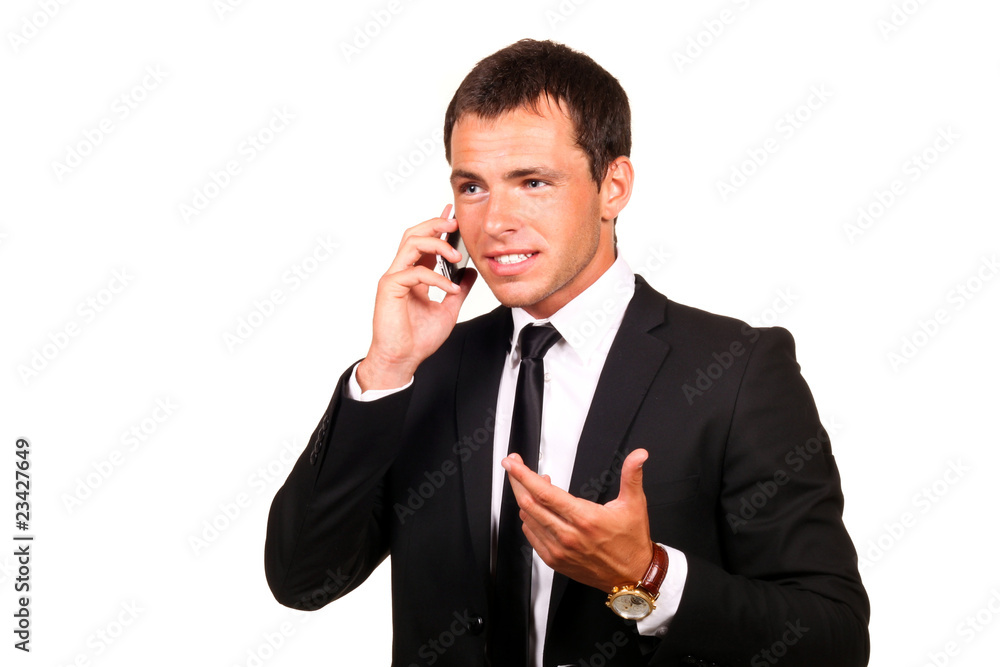Portrait of a handsome young business man on cell phone Portrait of a handsome young business man on cell phone