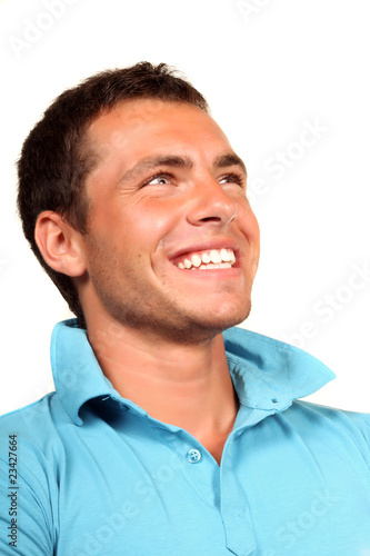 Closeup portrait of a handsome happy young man