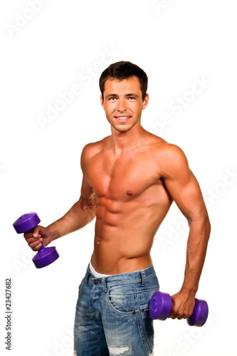 Sexy muscular man doing lifting