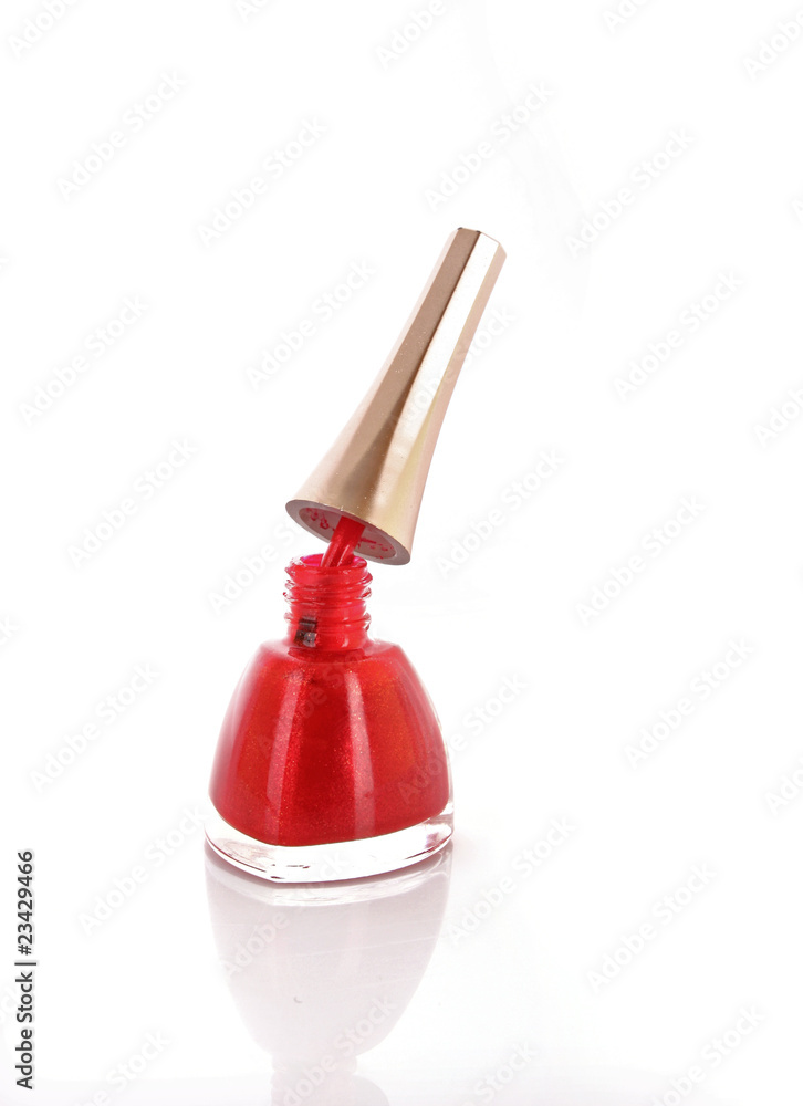 Red nail polish on white background Red nail polish on white background