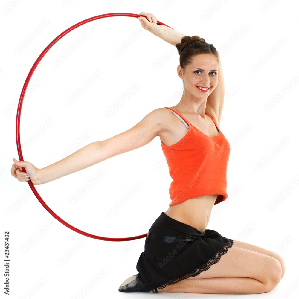 Fitness girl sits with hula hoop Fitness girl sits with hula hoop