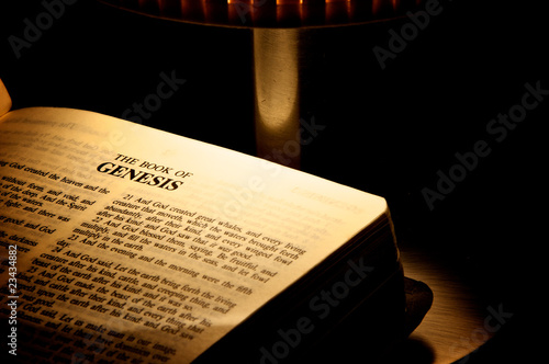 Canvas Print Bible underside of a candlestick