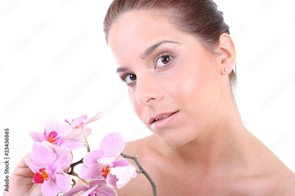 Young beautiful healthy woman with orchid