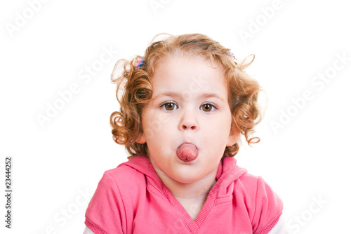 Фотография little girl sticking out tongue