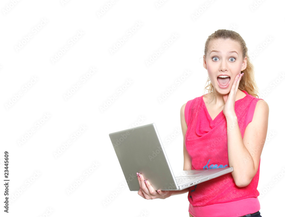 surprised girl with laptop over white surprised girl with laptop over white