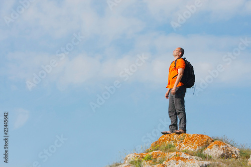 hiker on sky background