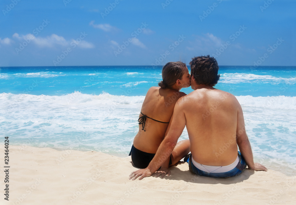 Young Couple enjoying a Romantic Beach Getaway