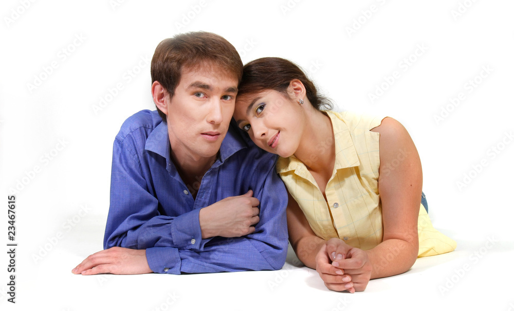 young loving couple over white