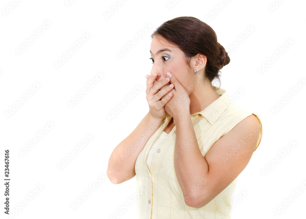 shocked girl closing her mouth with hands over white shocked girl closing her mouth with hands over white