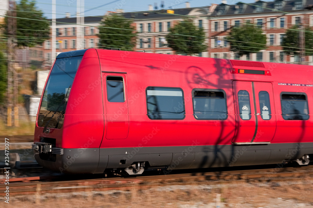 Passenger train in motion Passenger train in motion