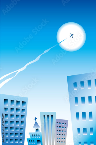 ビルと飛行機雲
