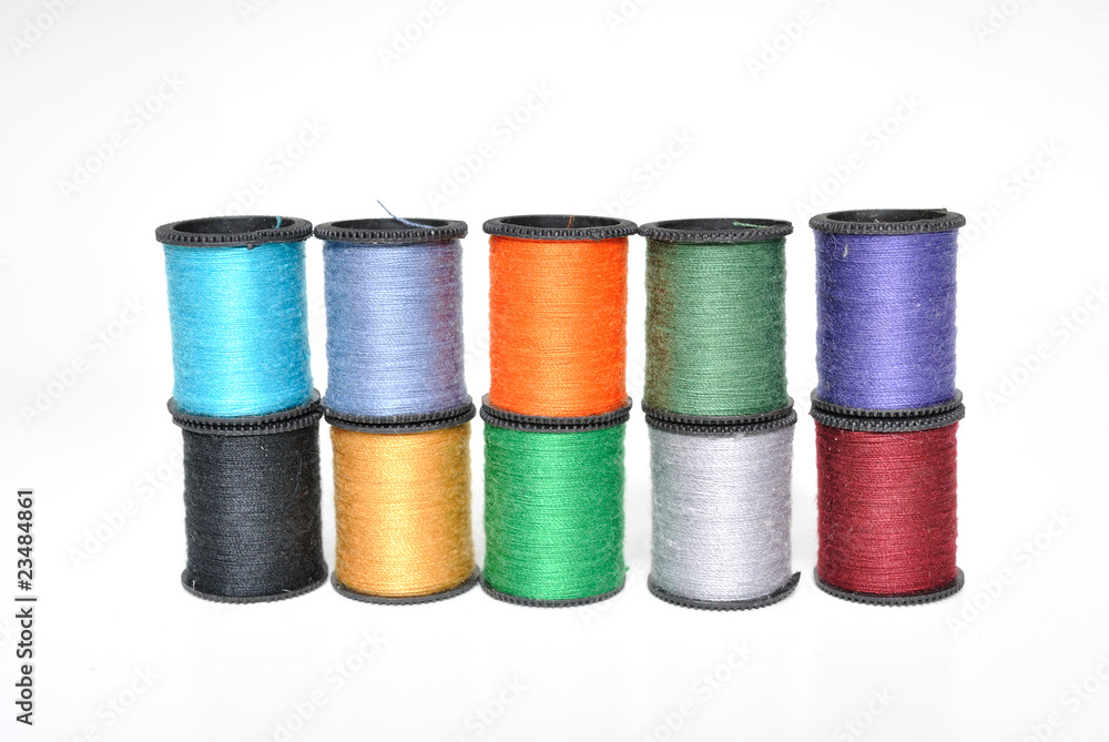 Thread Spools Stacked on White Thread Spools Stacked on White