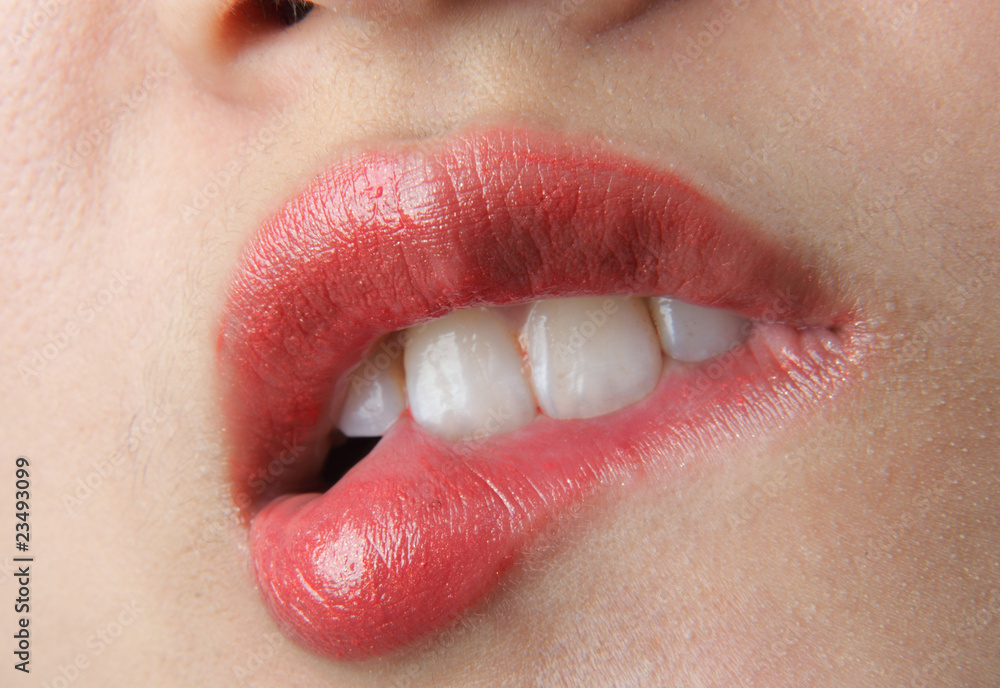 Fototapeta premium Beautiful lips of an attractive woman
