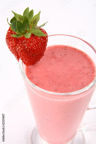 Strawberry shake in a glass decorated with a strawberry
