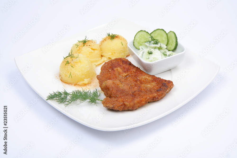 Pork chop, potatoes and cucumber salad Pork chop, potatoes and cucumber salad