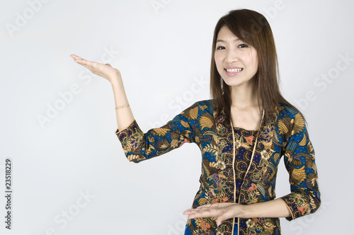 Canvas Print asian girl on batik