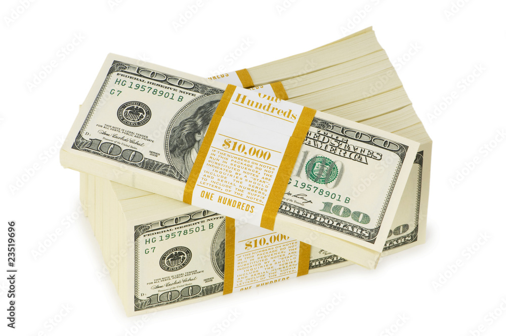 Stack of dollars isolated on the white Stack of dollars isolated on the white