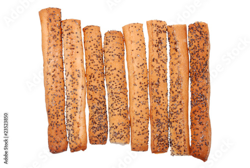 Salted breadsticks with poppy seed isolated on white