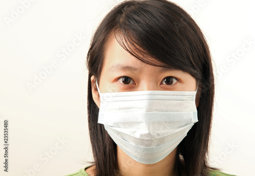 attractive young lady with a face mask