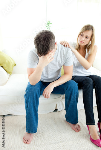 Caucasian couple having an argue in the living-room