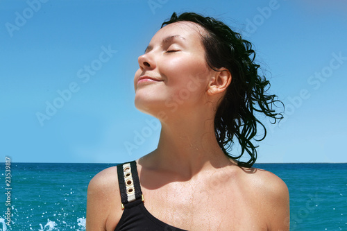 portrait of a girl on the background of the sea