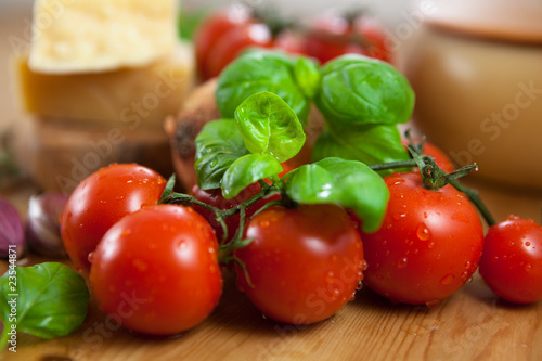 Close-up of fresh cherry tomatoes and basil