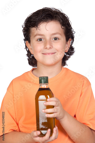 Fotografija Nice child with olive oil bottle