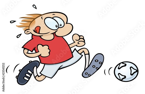 A soccer player dribbling with a football