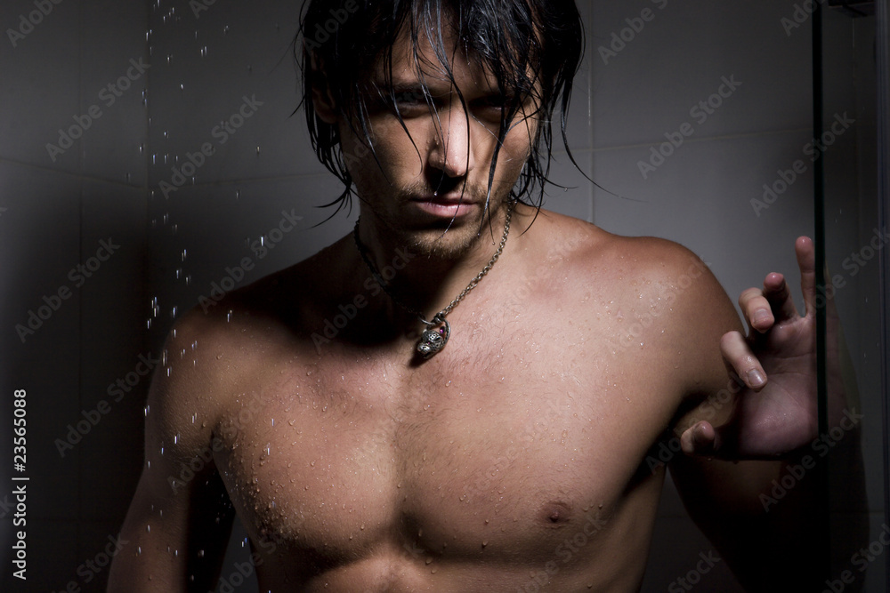 glamour portrait of the man on jets of water glamour portrait of the man on jets of water