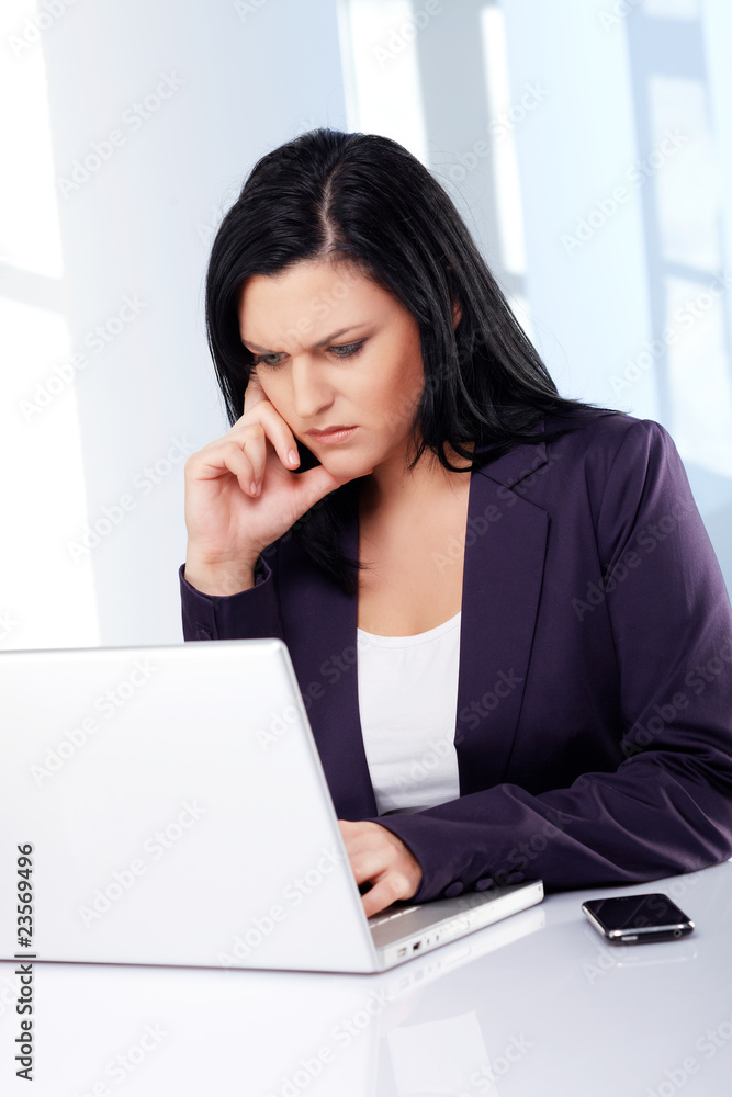Perplex business woman in the office Perplex business woman in the office
