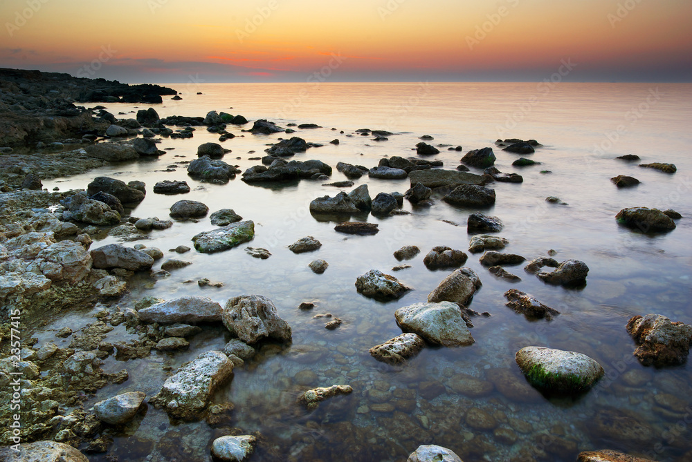 Sea and rock at the sunset Sea and rock at the sunset