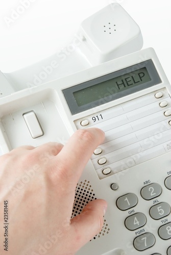 Tableau sur toile dialing the number on the phone. Quick dial to 911 theme.