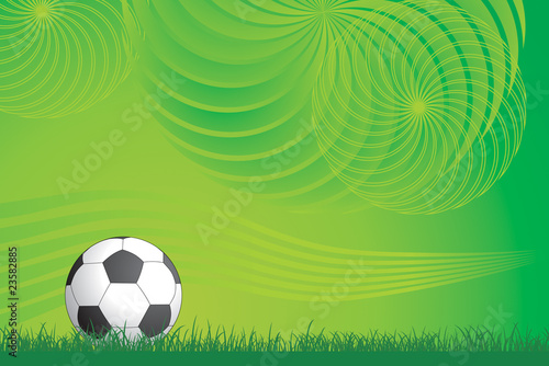 Soccer ball and green design background