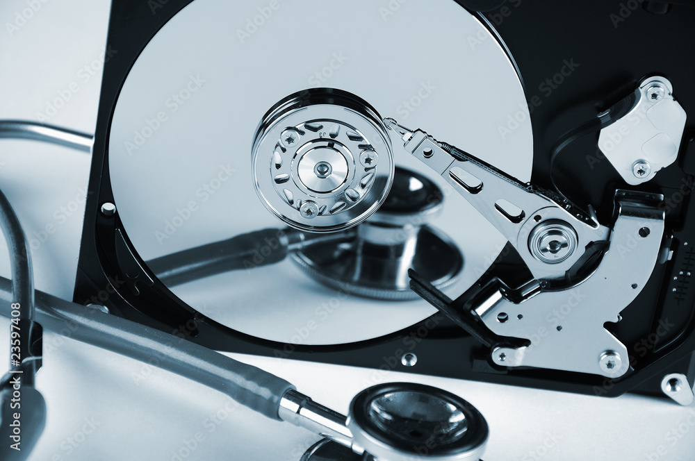 Computer hard drive and a stethoscope. Computer hard drive and a stethoscope.