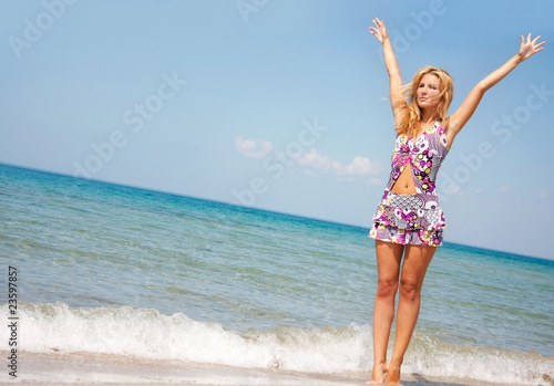 young happy girl on sea background