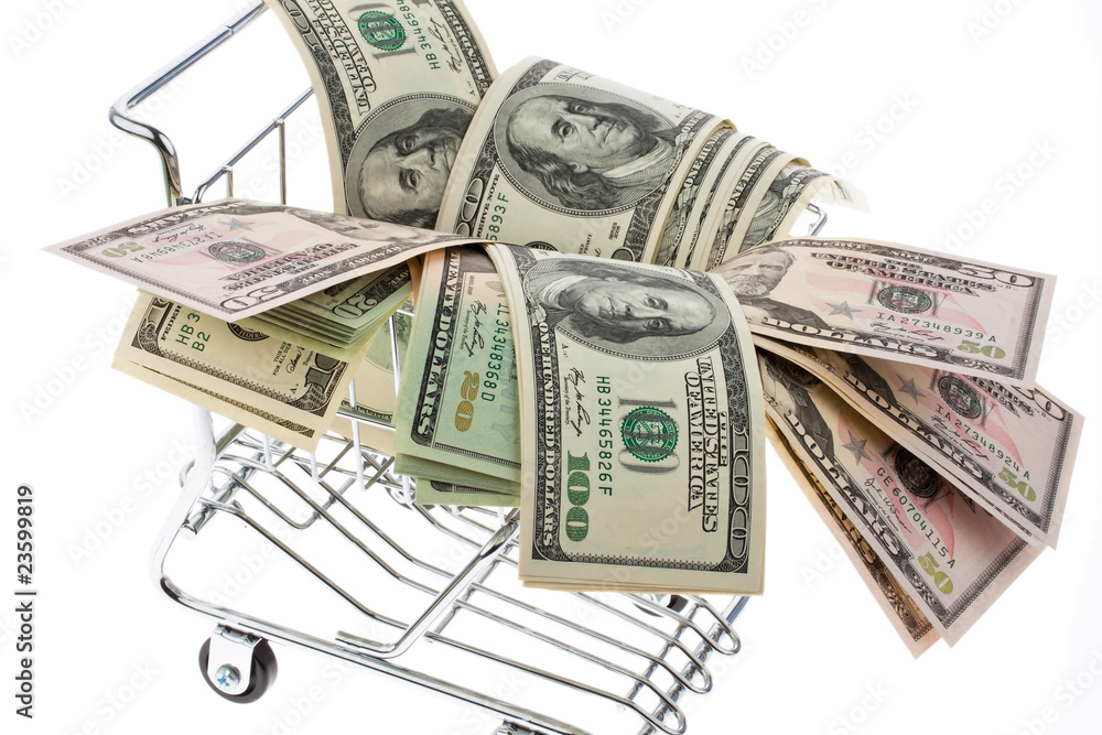 Dollar Geldscheine in einem Einkaufswagen Dollar Geldscheine in einem Einkaufswagen