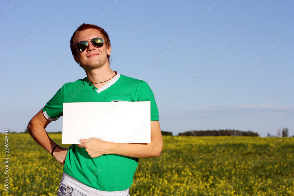 Young happy student holding form