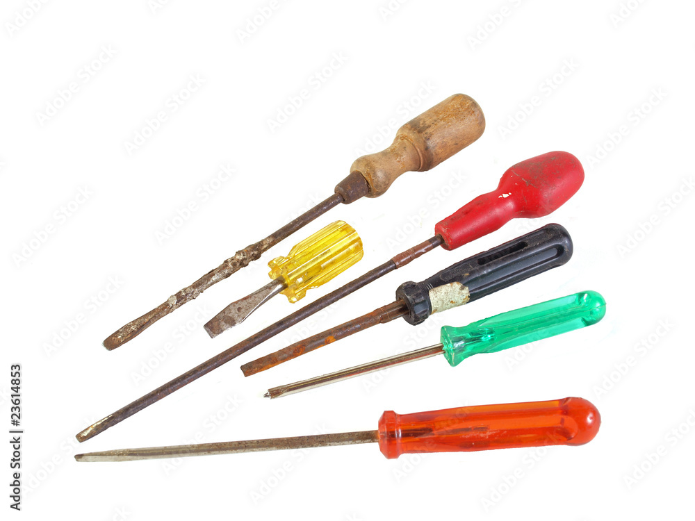 Old, rusty screwdrivers on a plain white background. Old, rusty screwdrivers on a plain white background.