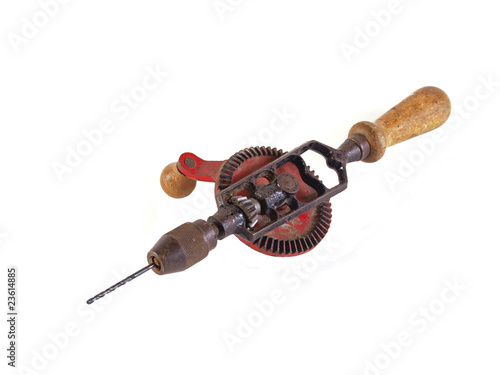 Old hand drill on a plain white background.