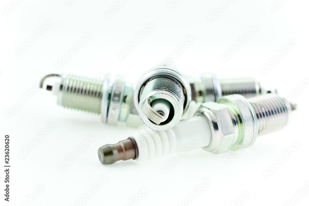 Four Spark Plugs on a white background Four Spark Plugs on a white background
