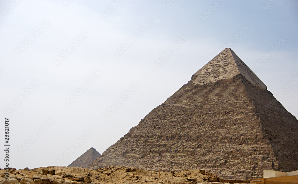 Ancient Egyptian pyramid of Giza against blue sky