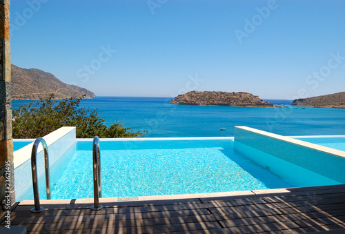 Swimming pool by luxury villa with a view on Spinalonga Island 