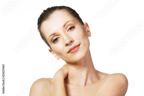 The beautiful young woman on a white background