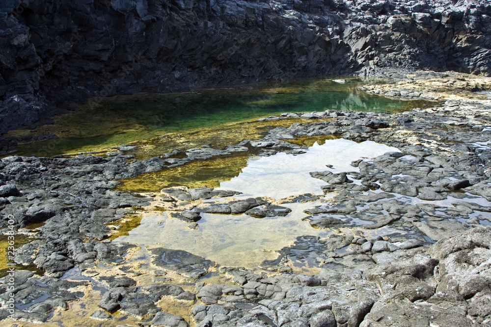 beautiful stone basins at the coast line