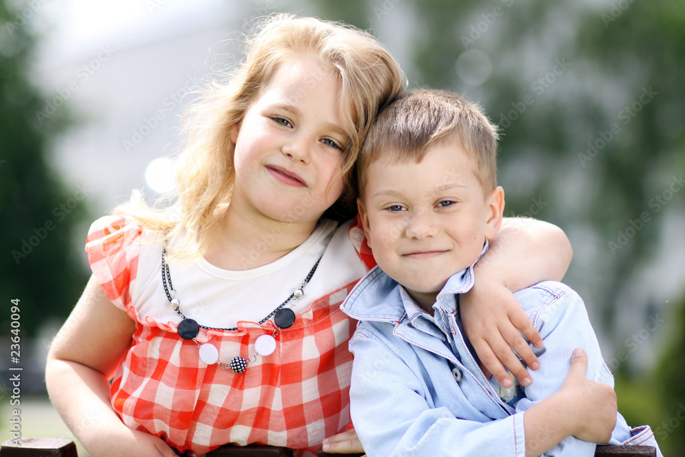 children in the summer park children in the summer park