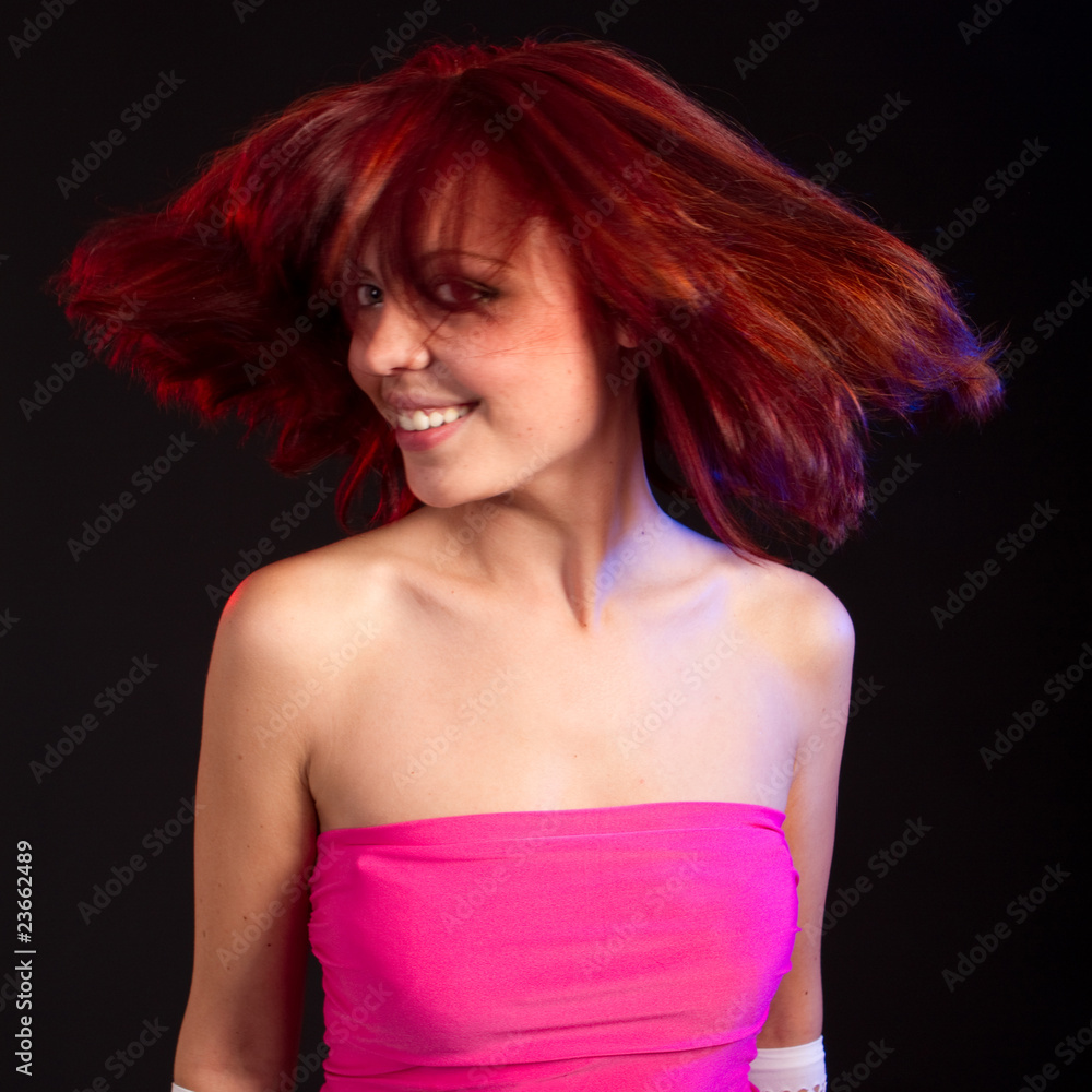 Naklejka premium Young redhead model